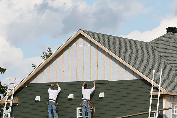 Professional Siding Installation technician working in Phoenix, MD